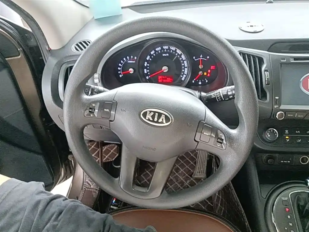 Kia Sportage 2014 — фото 11