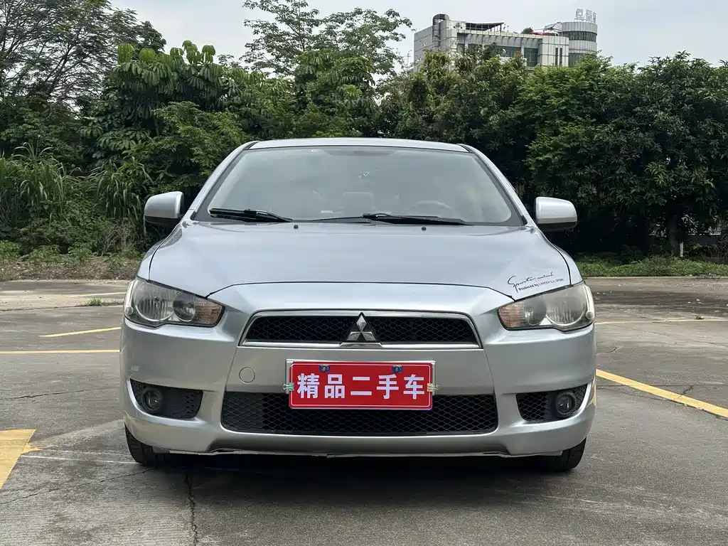 Mitsubishi Lancer EX 2010 — фото 2