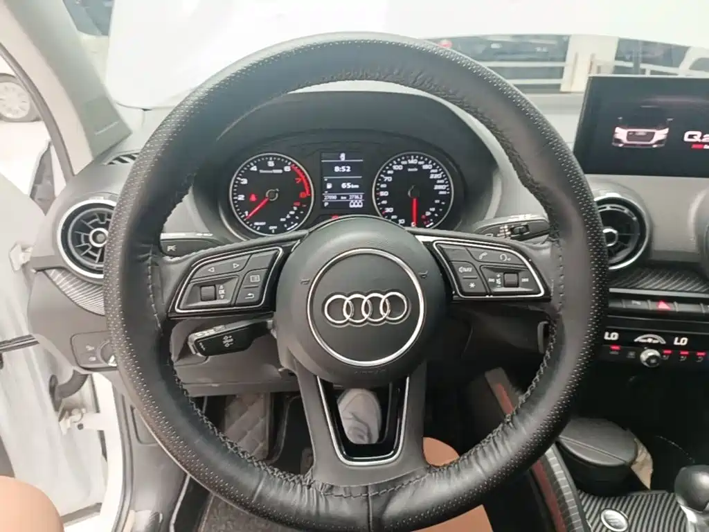 Audi Q2L 2021 — фото 11