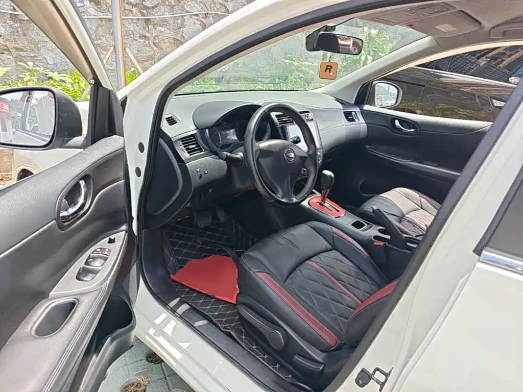 Nissan Tiida 2016 — фото 16