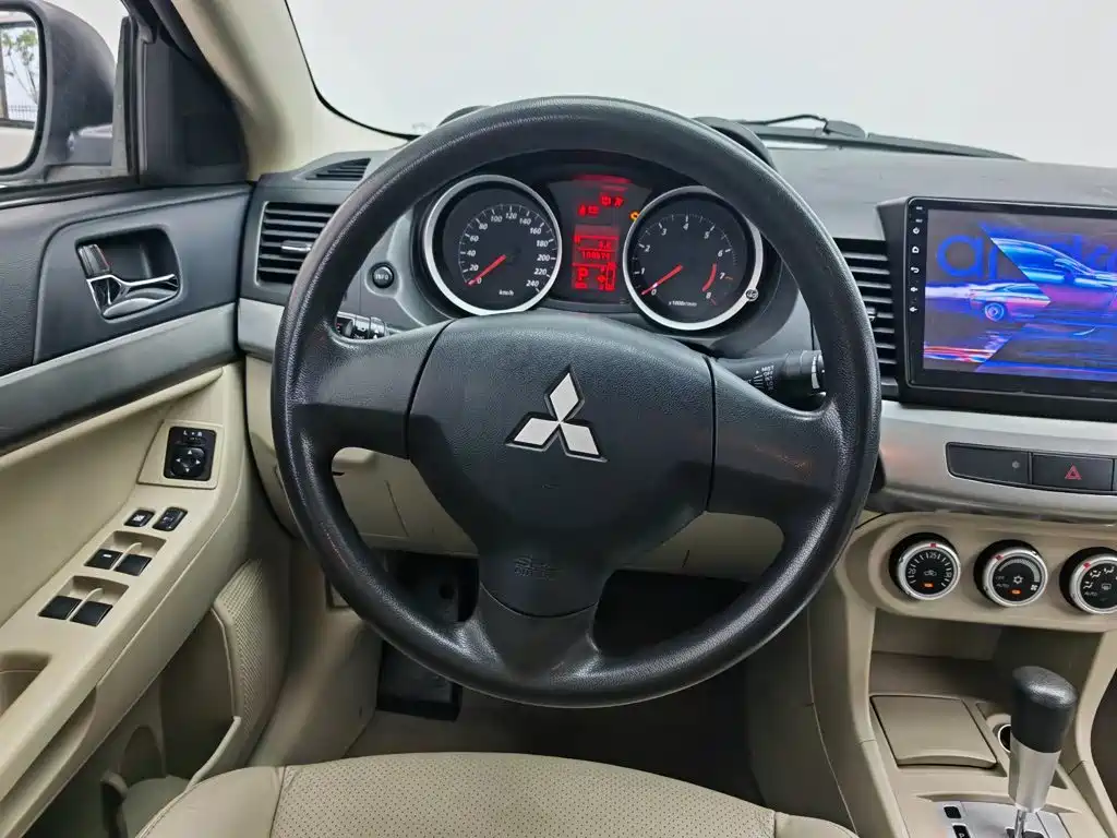 Mitsubishi Lancer EX 2010 — фото 11