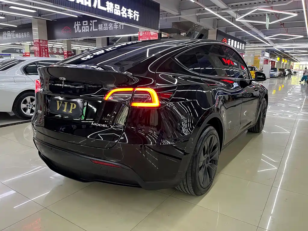 Tesla Model Y 2024 — фото 20