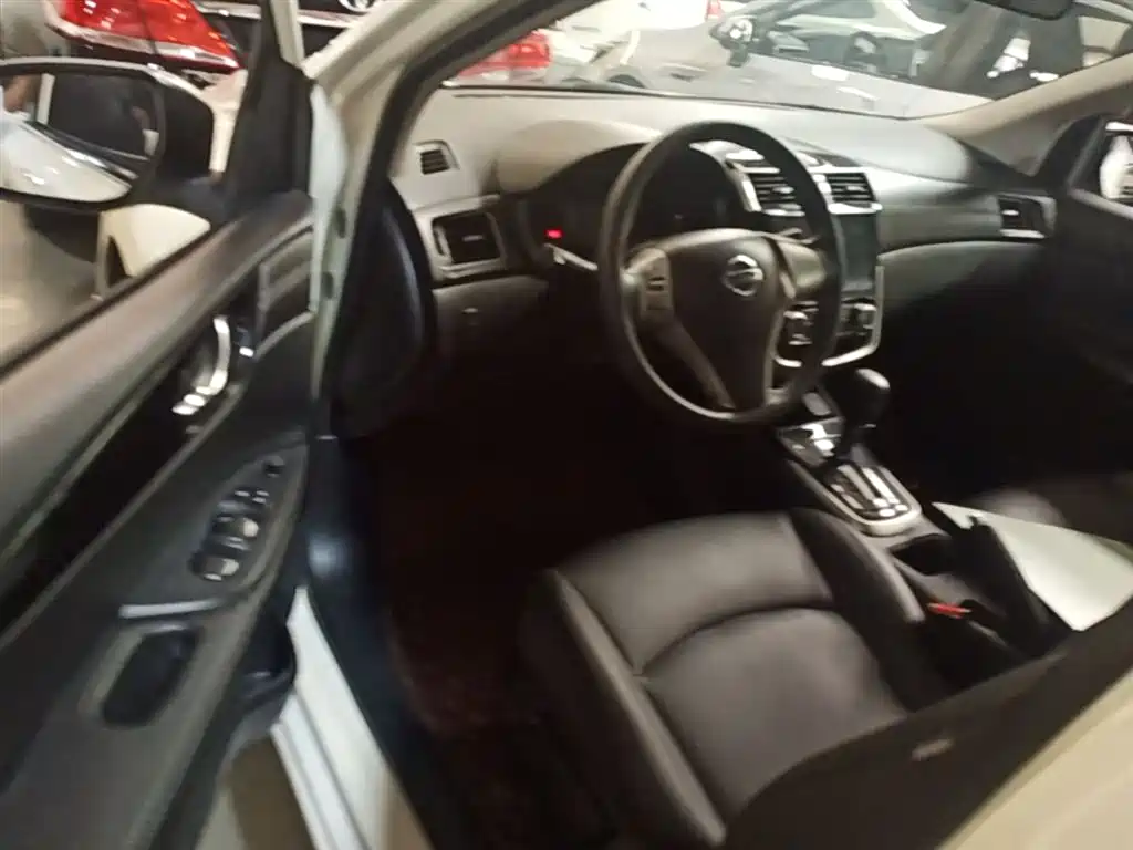 Nissan Tiida 2018 — фото 16