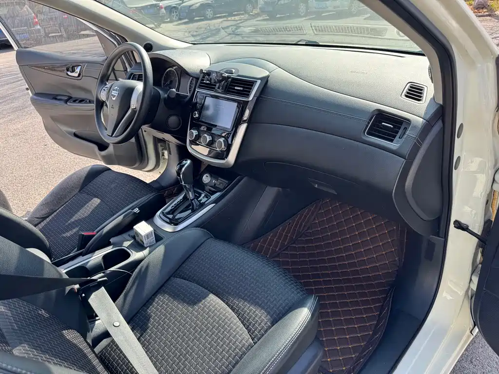 Nissan Tiida 2018 — фото 17