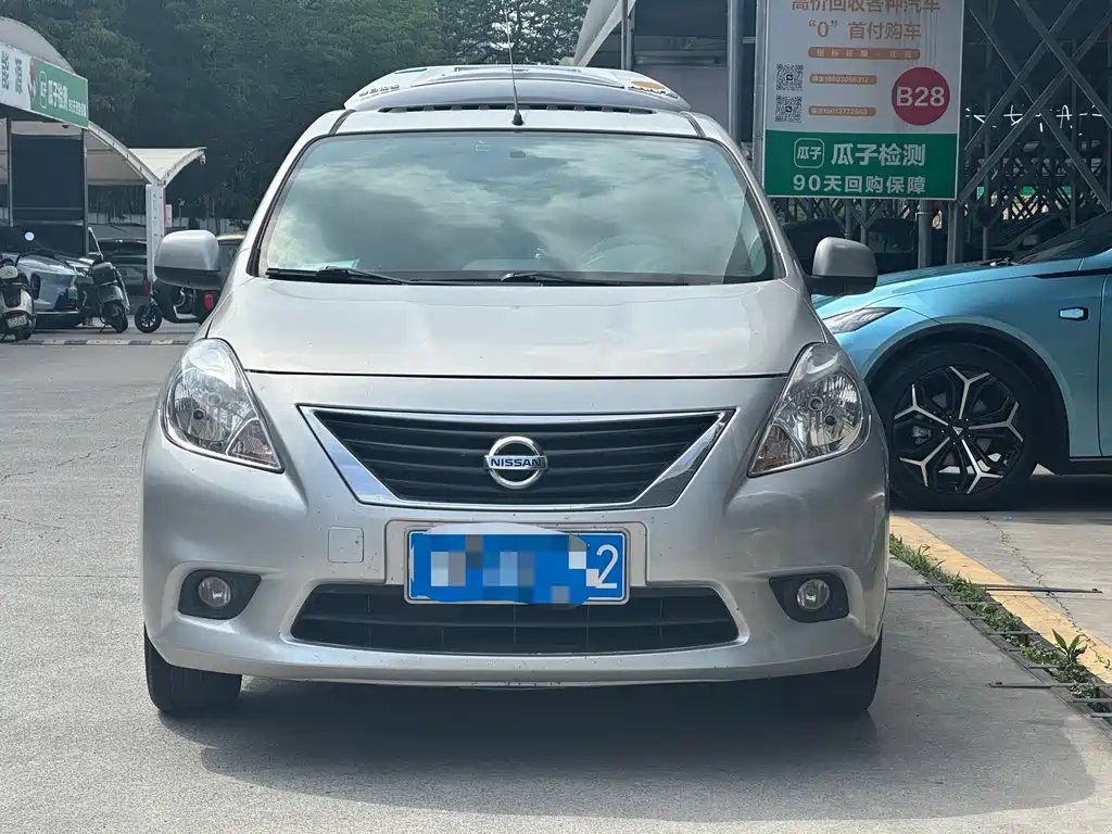 Nissan Sunny 2011 — фото 2