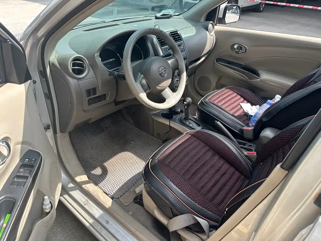 Nissan Sunny 2011 — фото 4
