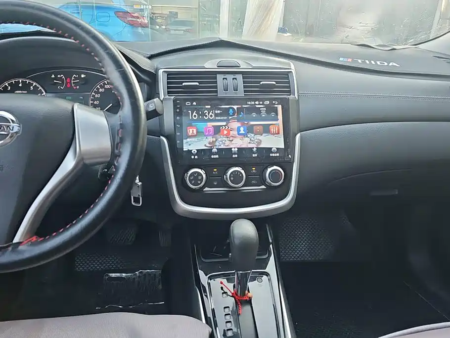 Nissan Tiida 2016 — фото 13