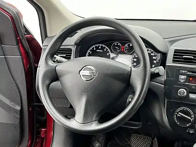 Nissan Tiida 2015 — фото 14
