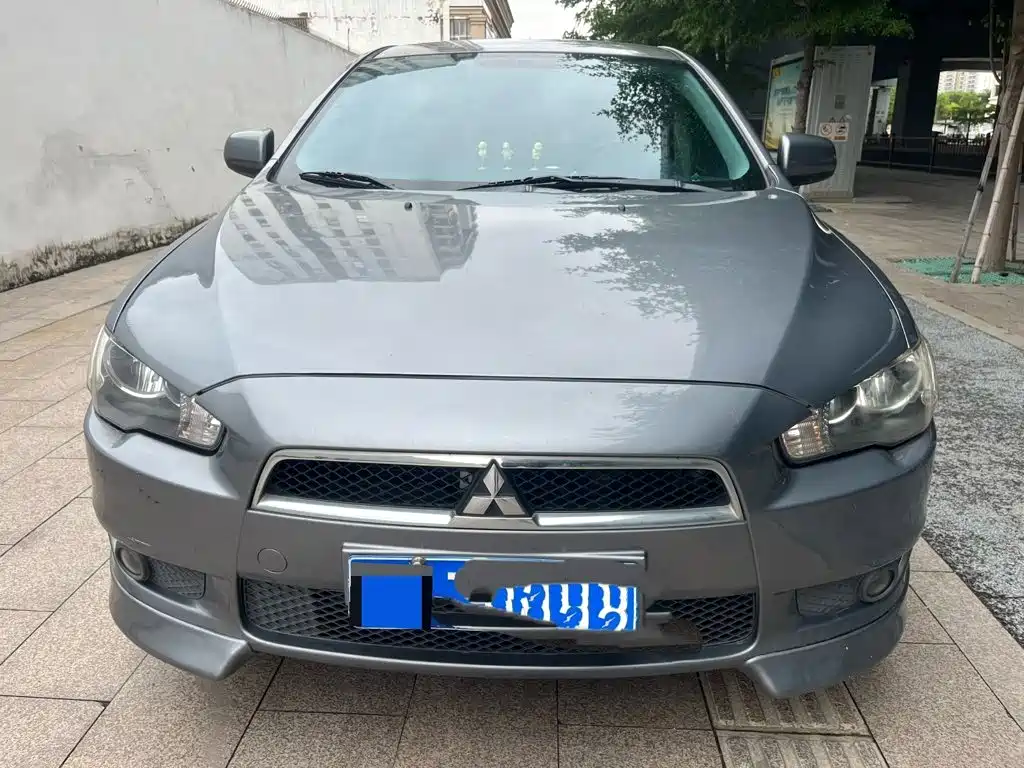 Mitsubishi Lancer EX 2010 — фото 2