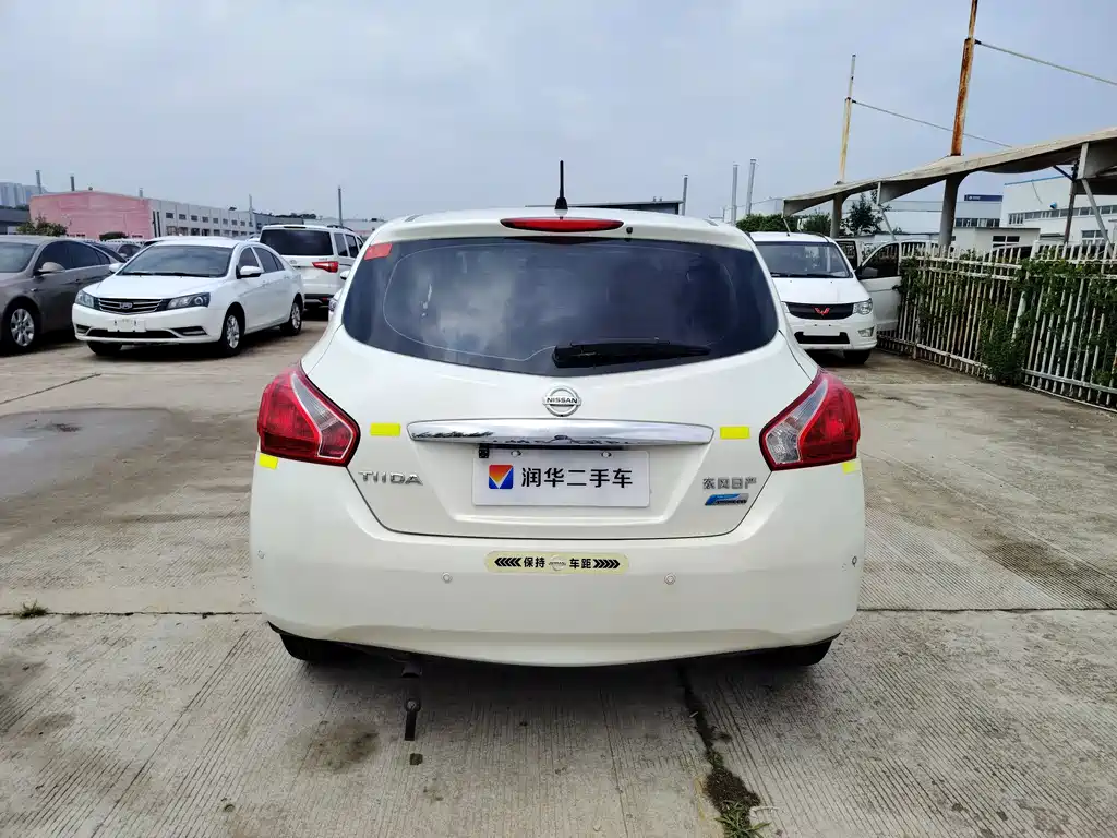 Nissan Tiida 2016 — фото 11