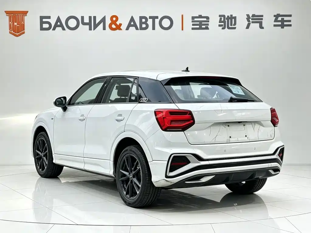 Audi Q2L 2022 — фото 12