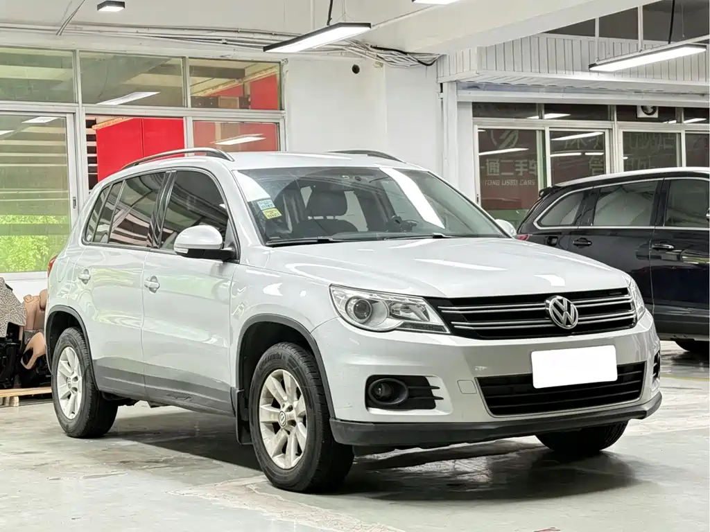 Volkswagen Tiguan 2013 — фото 3