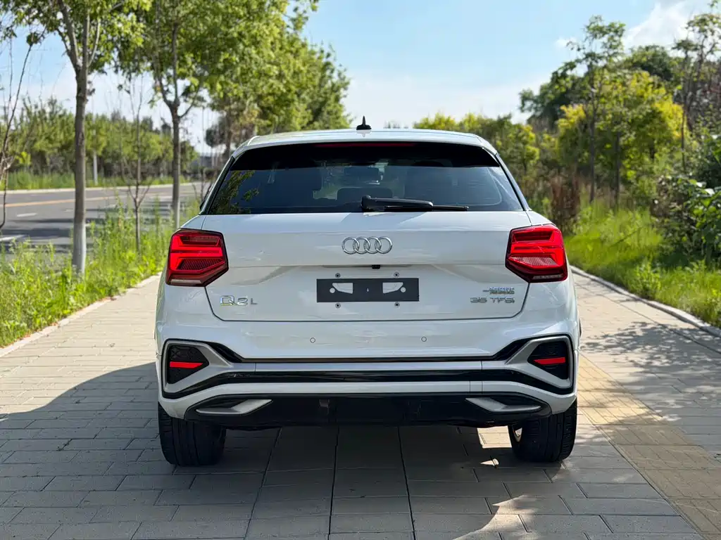 Audi Q2L 2023 — фото 23