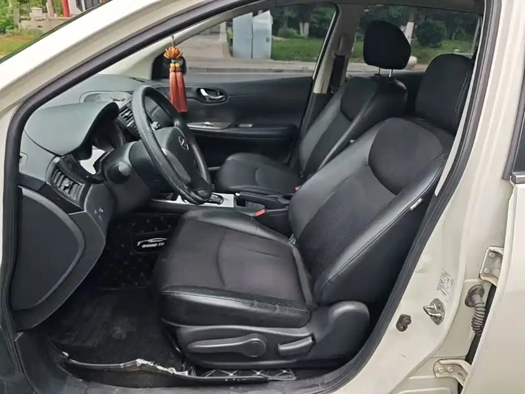 Nissan Tiida 2016 — фото 15