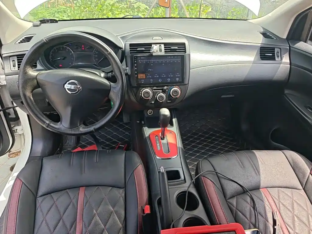 Nissan Tiida 2016 — фото 10