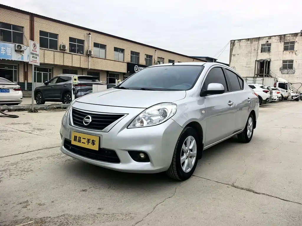 Nissan Sunny 2011 — фото 1