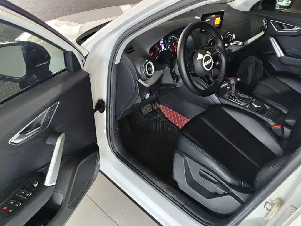 Audi Q2L 2021 — фото 16