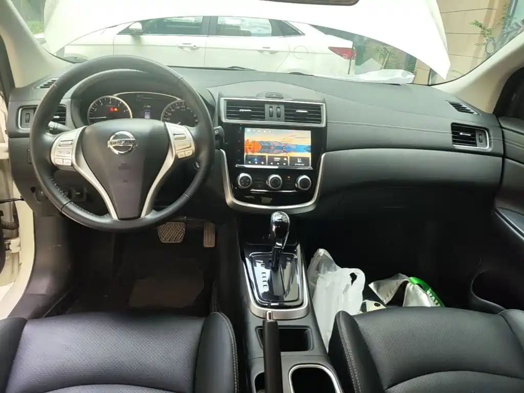 Nissan Tiida 2021 — фото 10