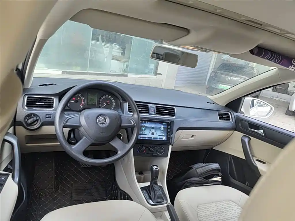 Skoda Rapid 2014 — фото 10