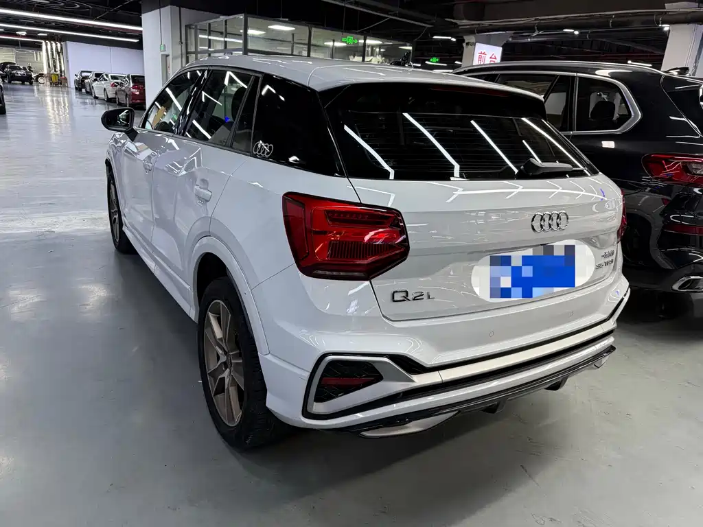 Audi Q2L 2023 — фото 19