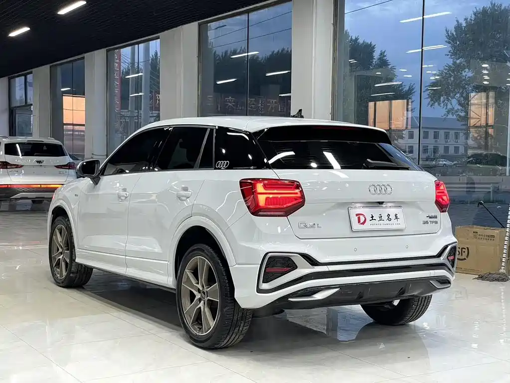 Audi Q2L 2023 — фото 6