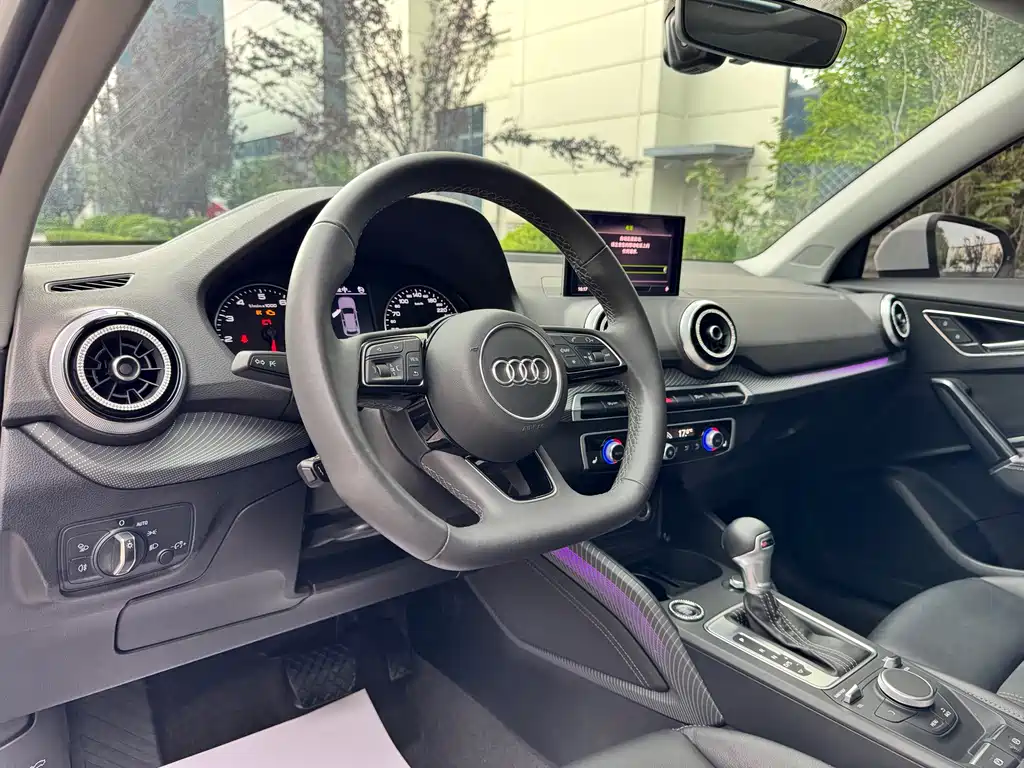 Audi Q2L 2022 — фото 13