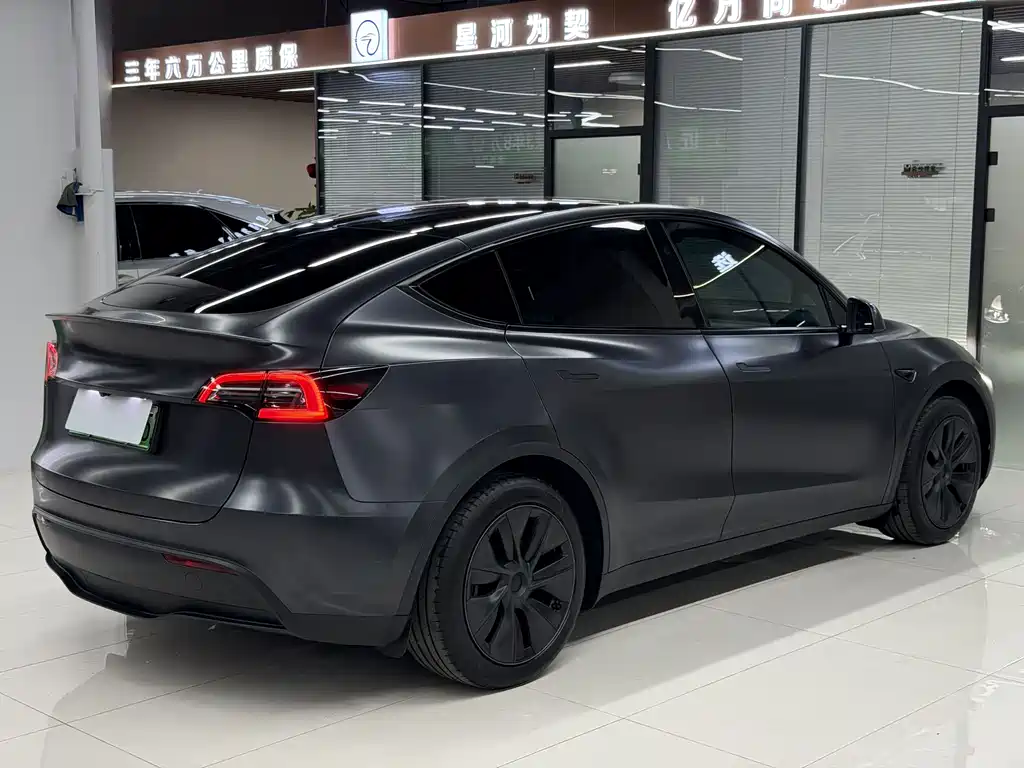 Tesla Model Y 2024 — фото 19