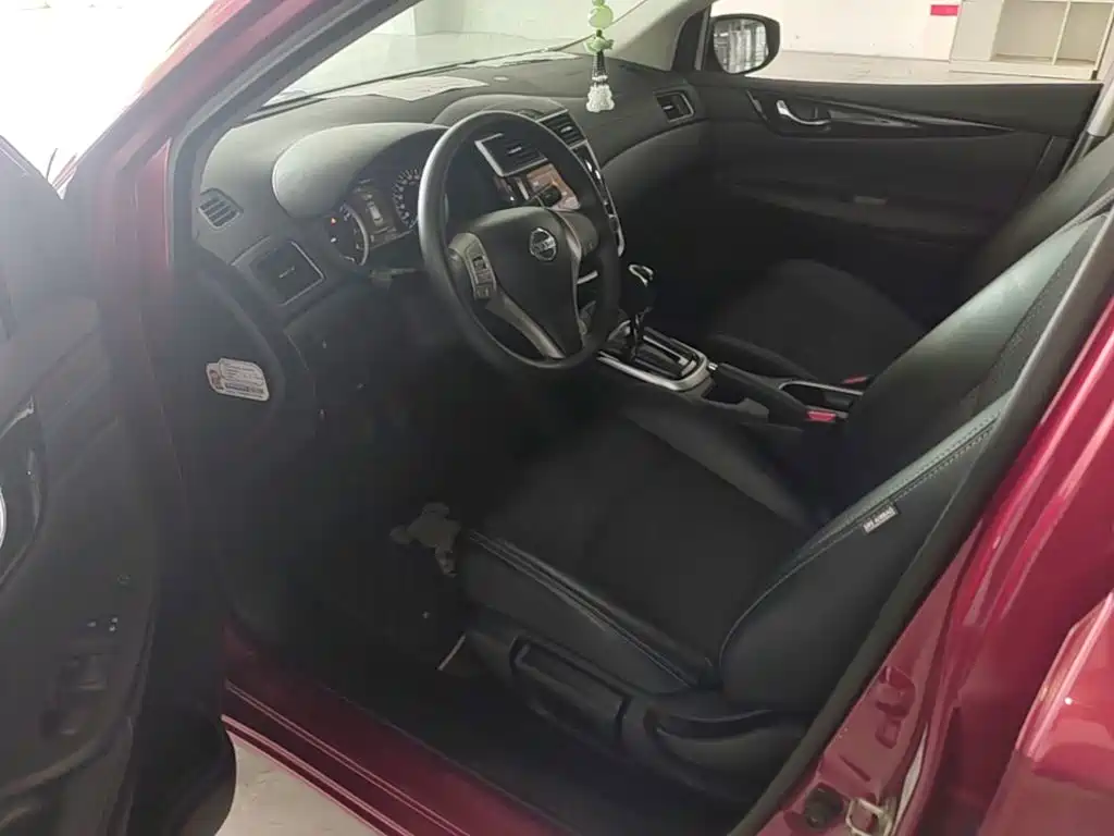 Nissan Tiida 2019 — фото 16