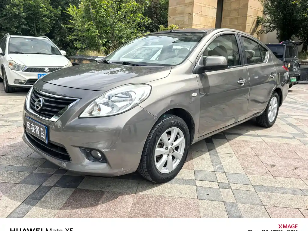 Nissan Sunny 2011 — фото 1