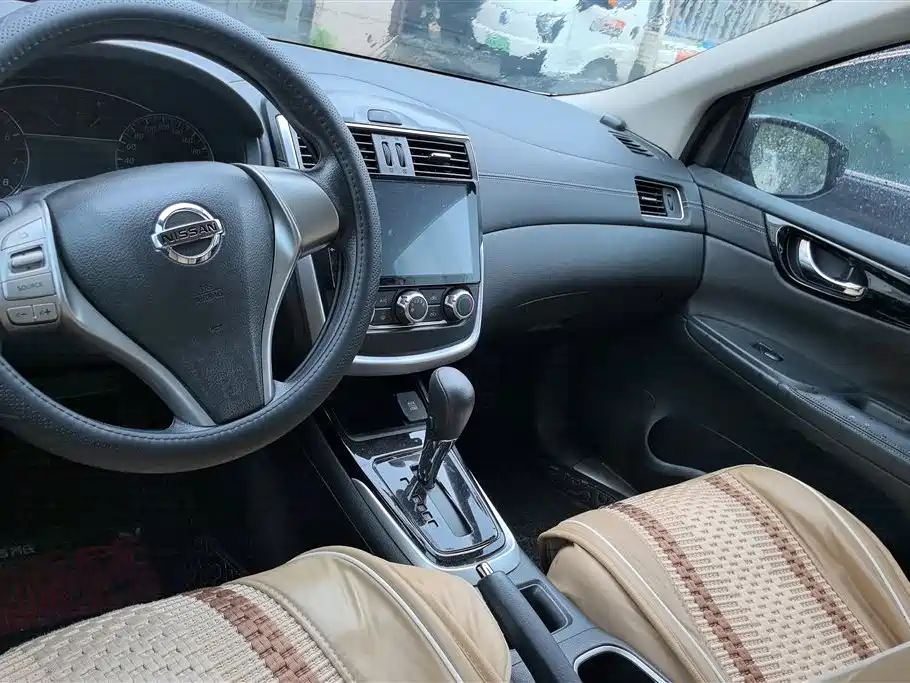 Nissan Tiida 2017 — фото 12