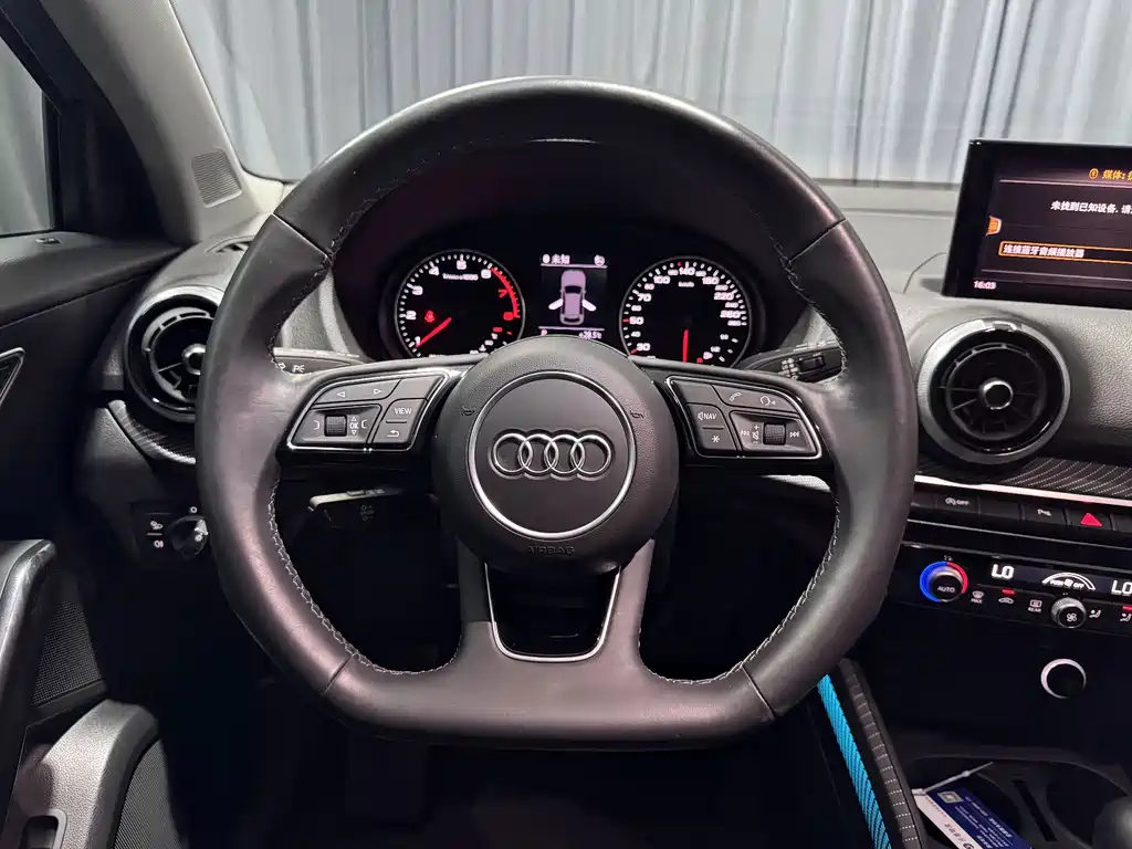Audi Q2L 2022 — фото 12