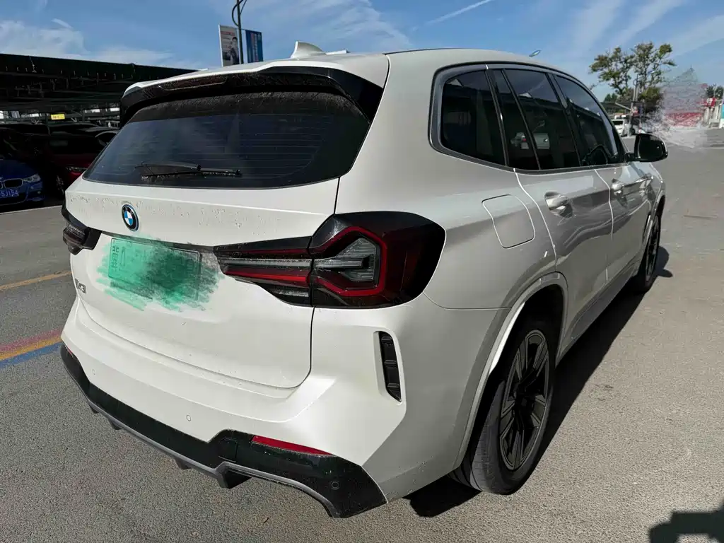 BMW iX3 2024 — фото 11