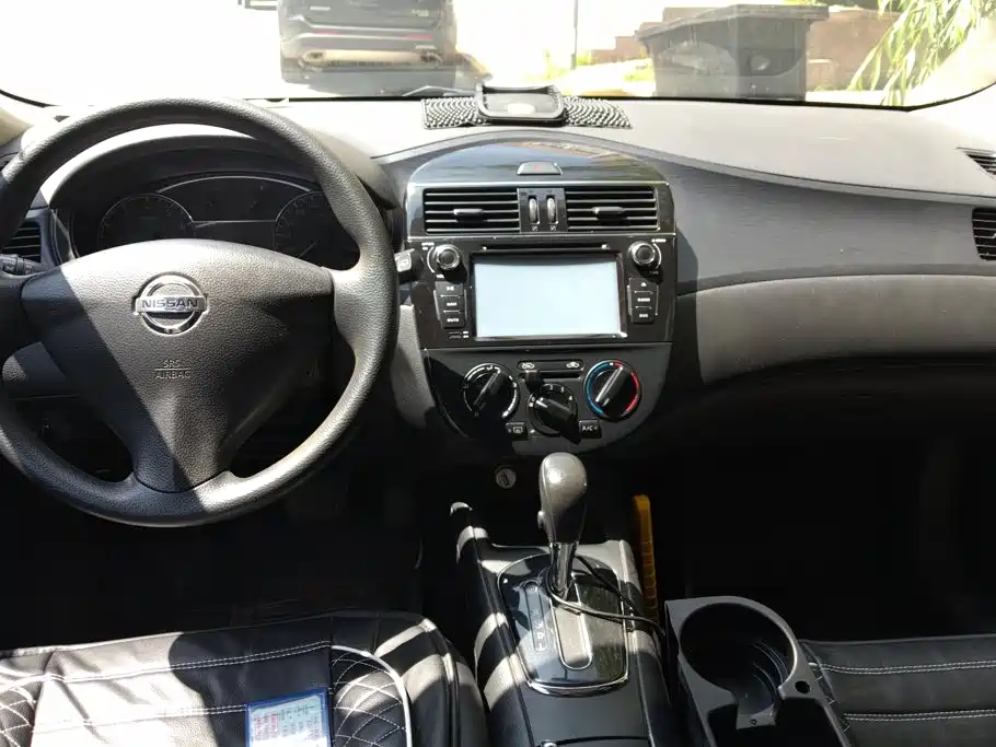 Nissan Tiida 2014 — фото 12