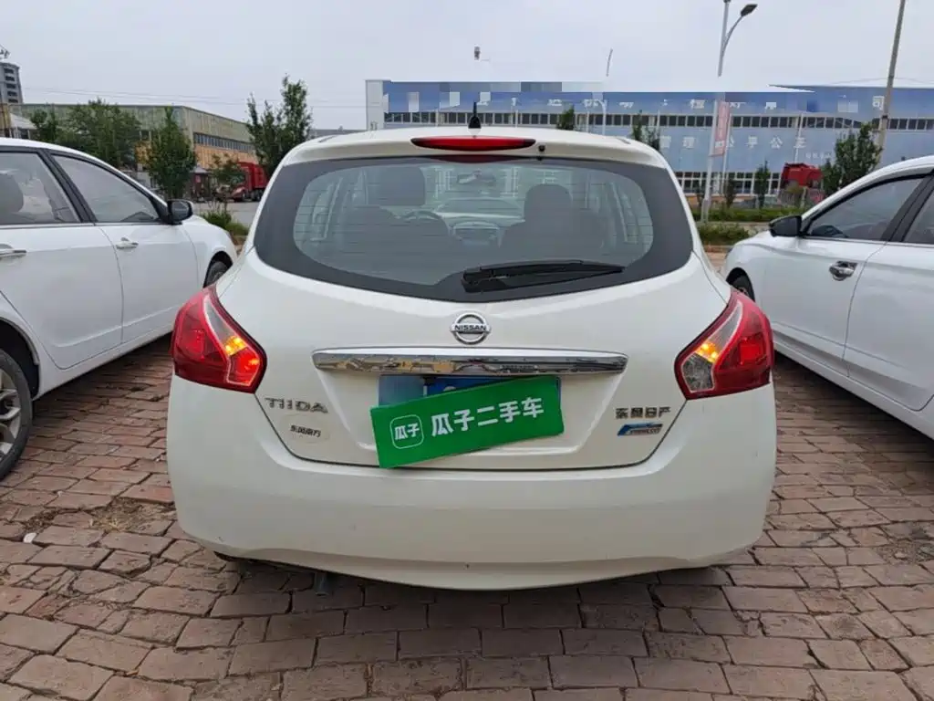 Nissan Tiida 2015 — фото 6