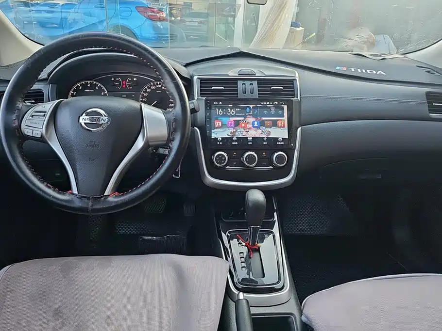 Nissan Tiida 2016 — фото 12