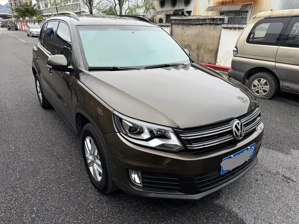 Volkswagen Tiguan 2014 — фото 2