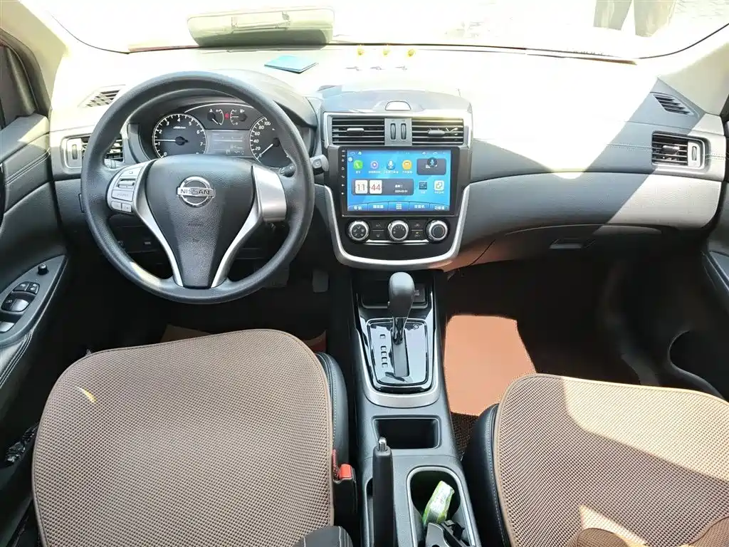 Nissan Tiida 2016 — фото 13
