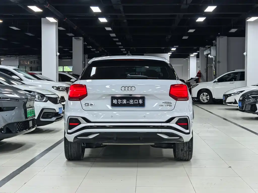 Audi Q2L 2023 — фото 25