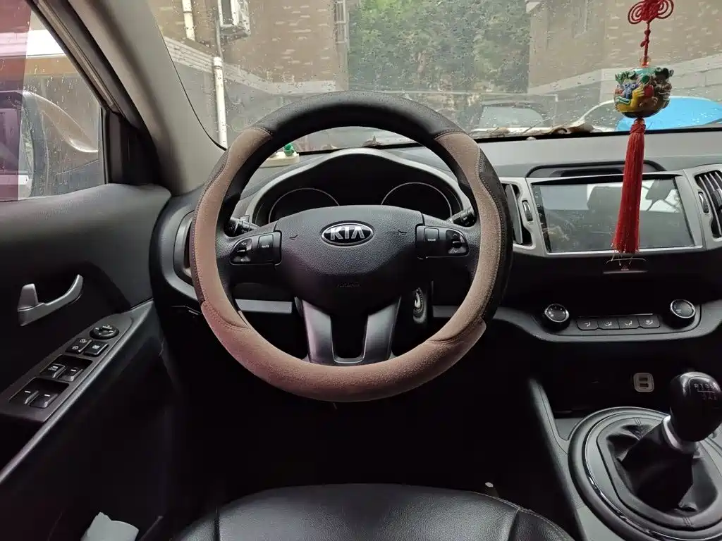 Kia Sportage 2014 — фото 11