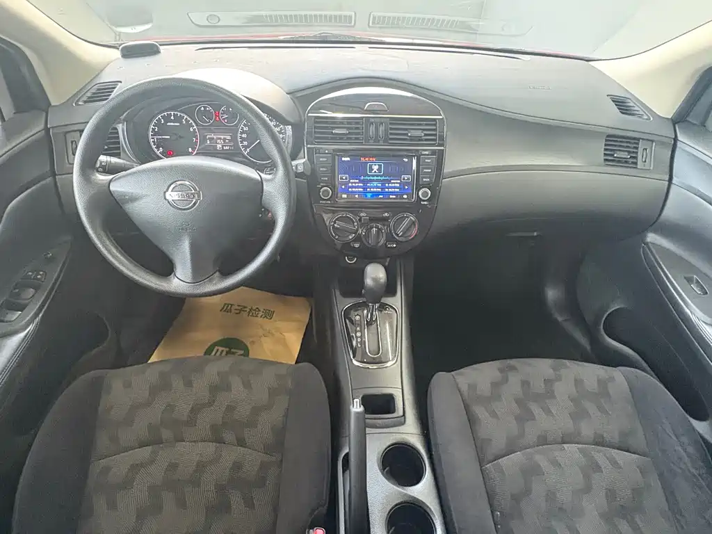 Nissan Tiida 2015 — фото 12
