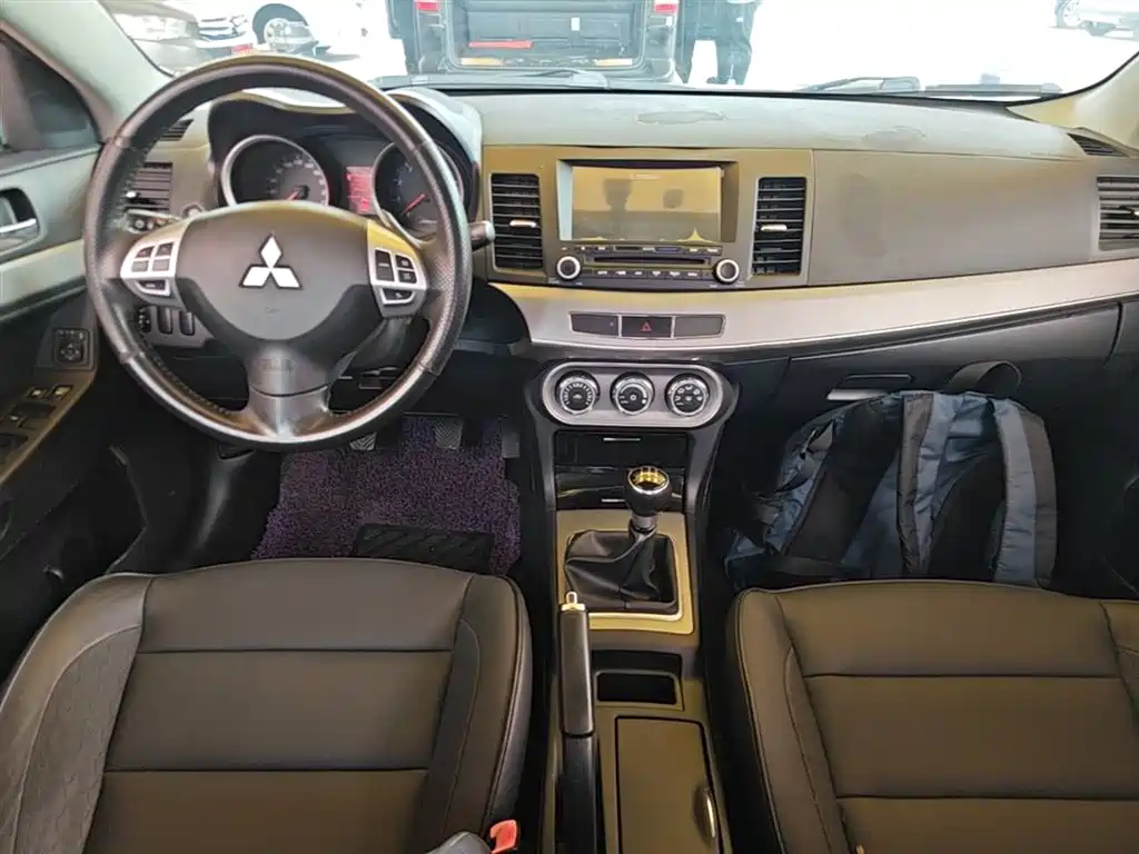 Mitsubishi Lancer EX 2015 — фото 10