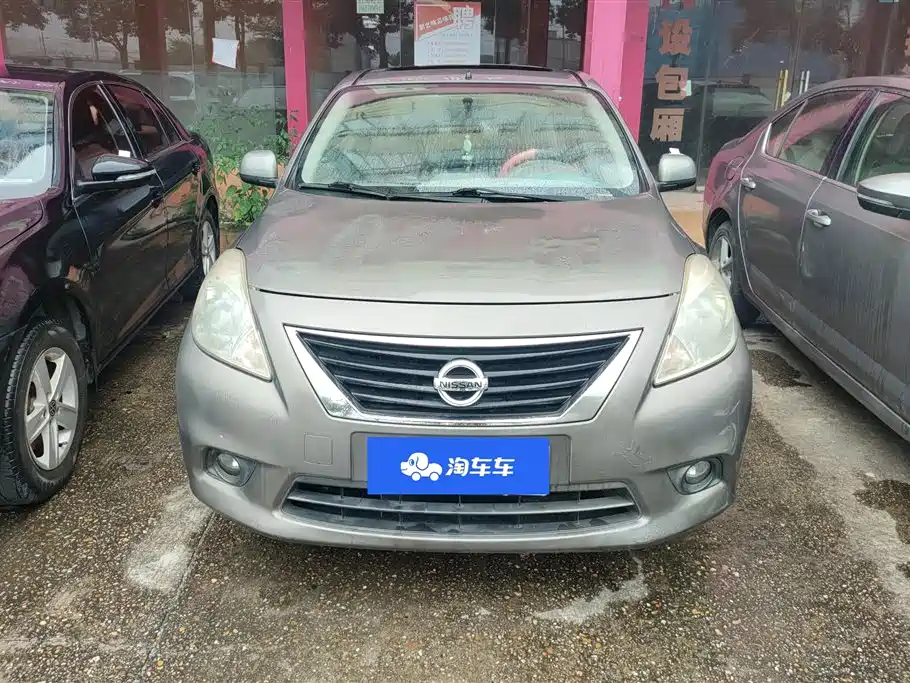 Nissan Sunny 2011 — фото 2