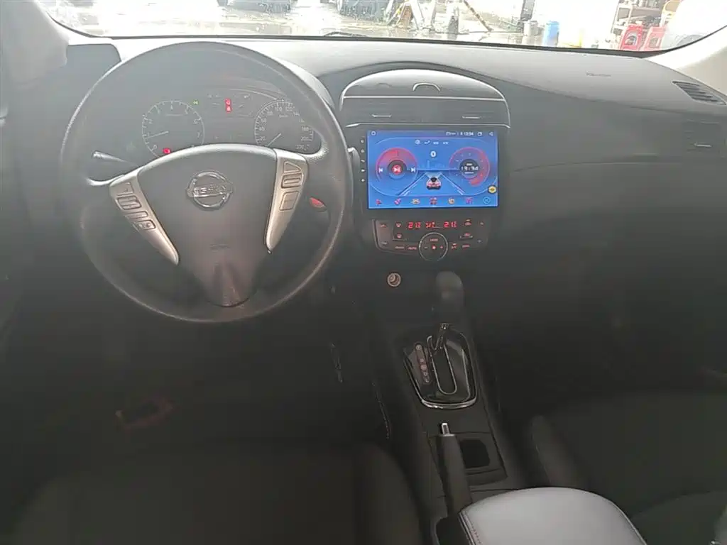 Nissan Tiida 2016 — фото 10