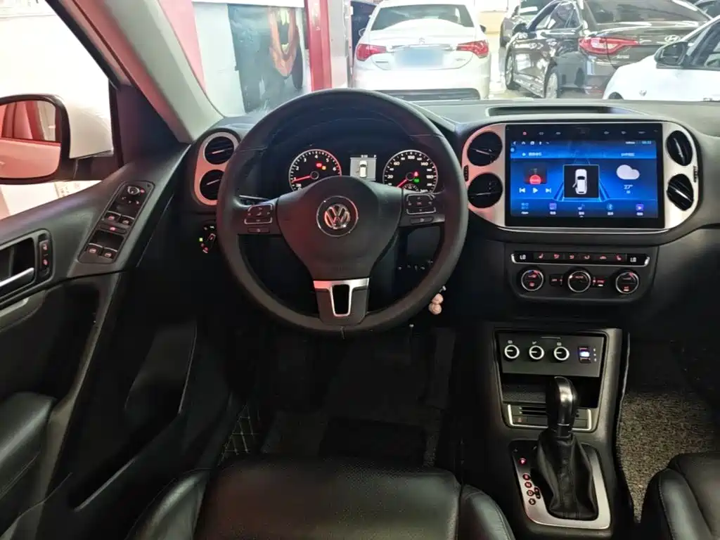 Volkswagen Tiguan 2014 — фото 11