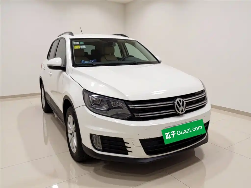 Volkswagen Tiguan 2014 — фото 3