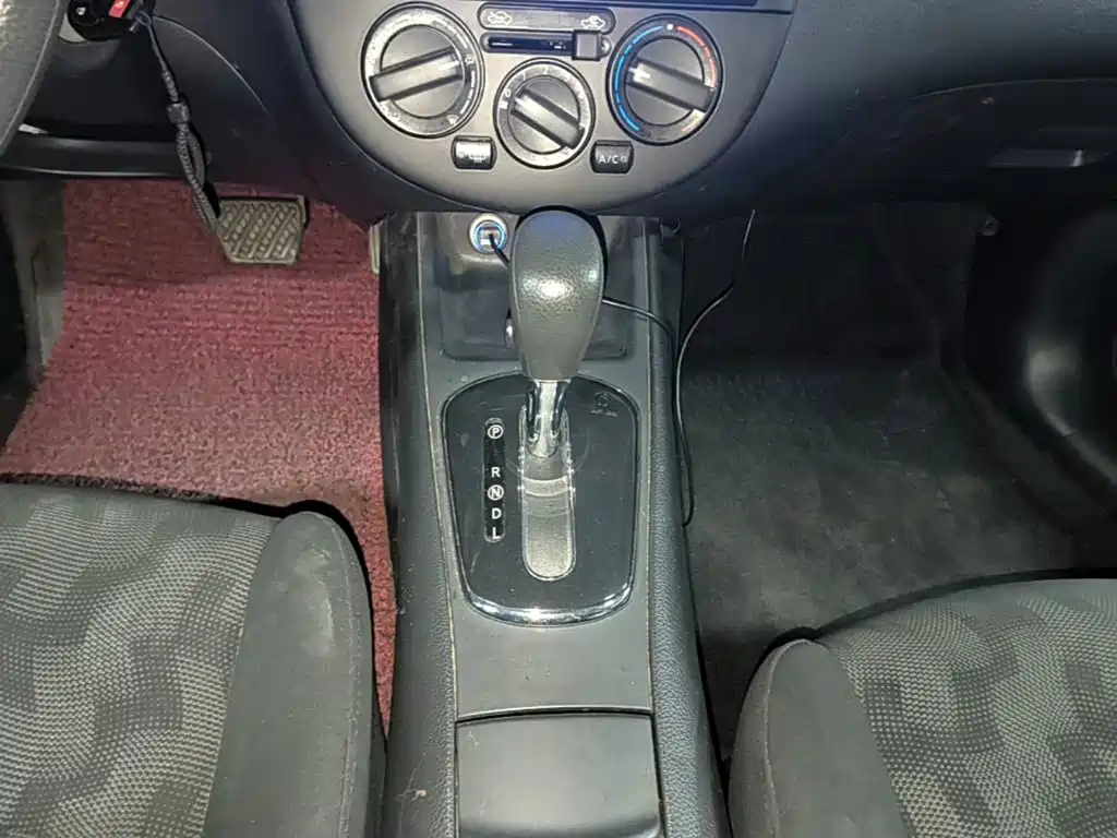 Nissan Tiida 2014 — фото 14