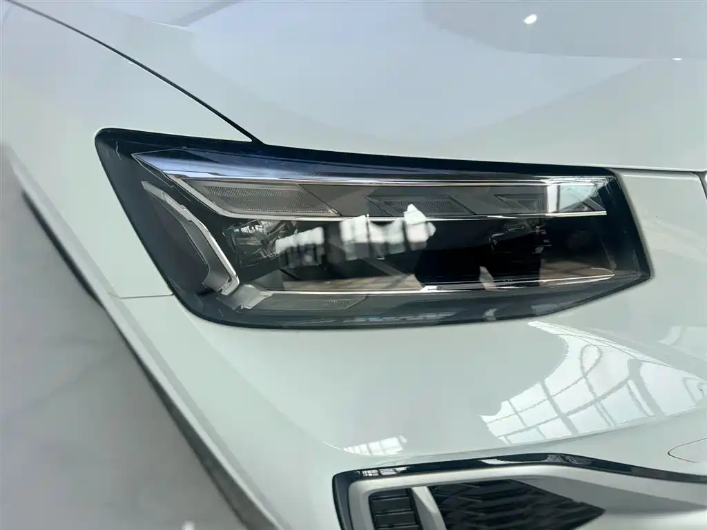 Audi Q2L 2023 — фото 11