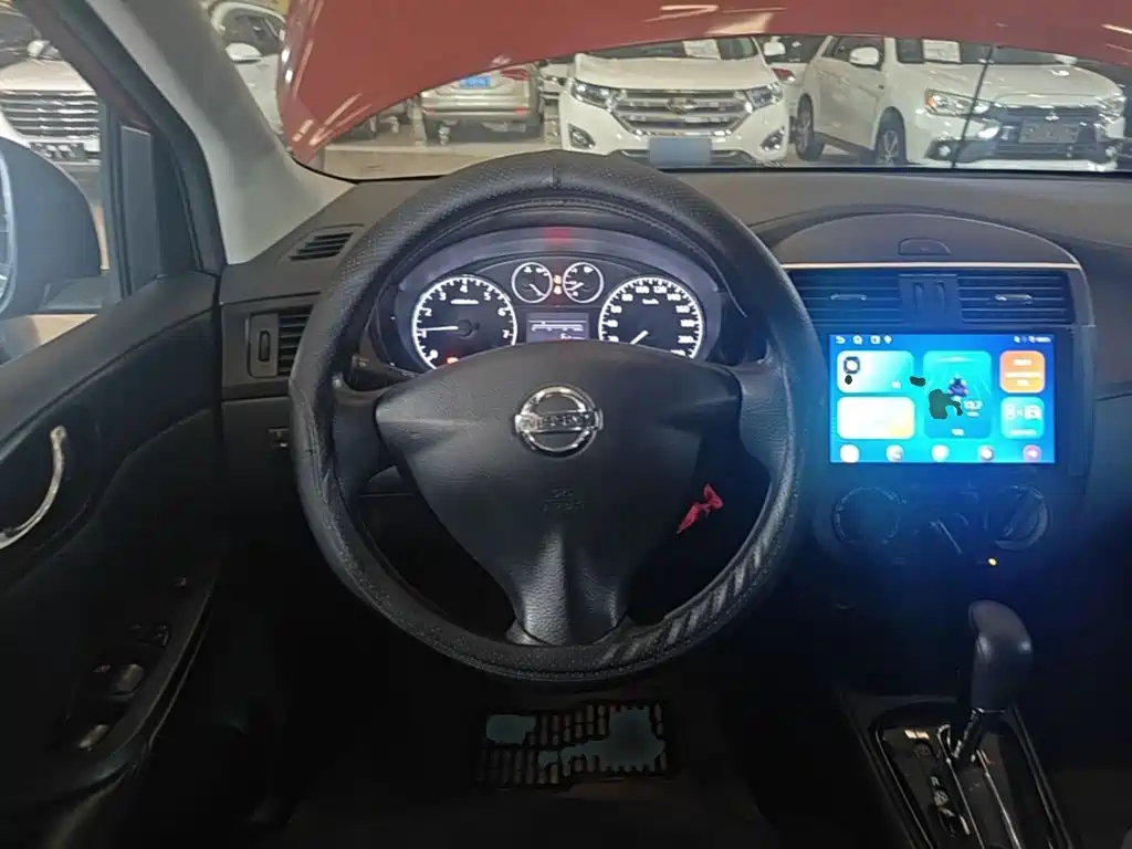 Nissan Tiida 2015 — фото 11