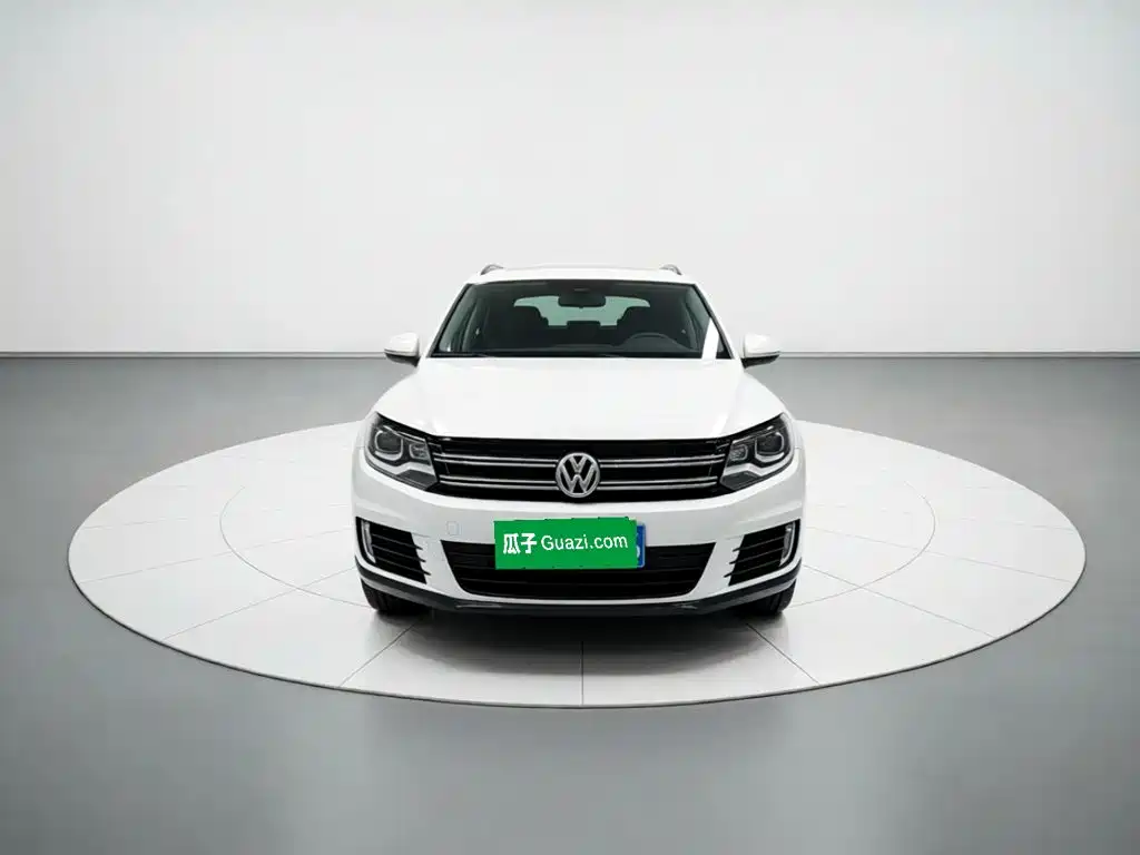 Volkswagen Tiguan 2014 — фото 2