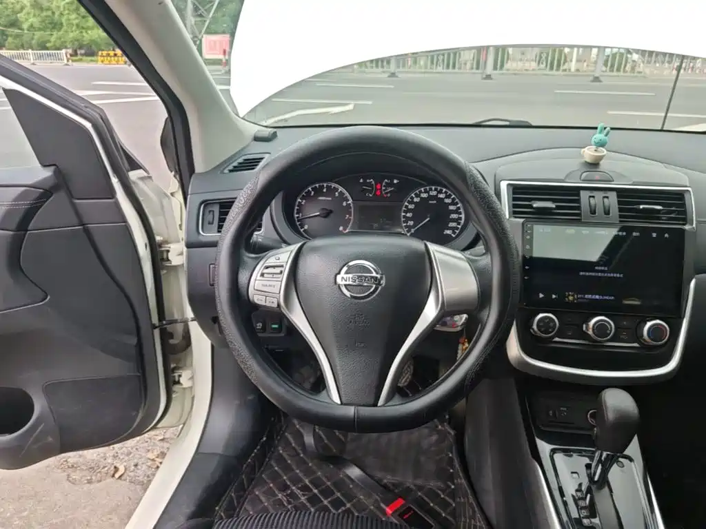 Nissan Tiida 2022 — фото 11